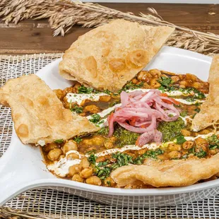 Chole Bhatura, Flaky Sourdough Served with Chickpeas, Pickled Onions &amp; Cilantro Chutney, Tamarind Chutney &amp; Dill Yogurt Sauce