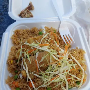 Fried rice and fried chicken.  The chicken is so good. Crispy and sweet. Not much but just a hint of sweet and perfect.