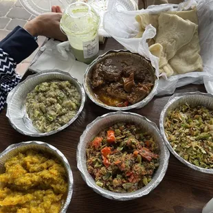 Breakfast: Roti; stewed Oxtail ; smoked herring ; salt fish; pumpkin and baigan choka.