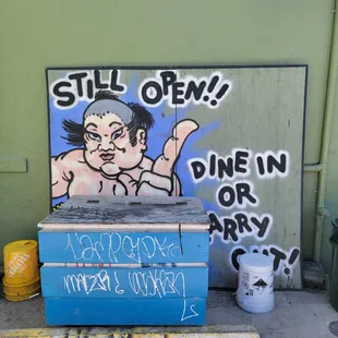 Fun sign in the parking lot out back