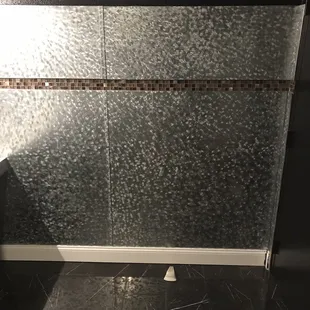 a toilet in a restroom