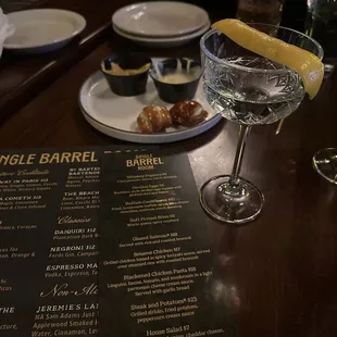 Wet vodka martini and pretzel bites and queso