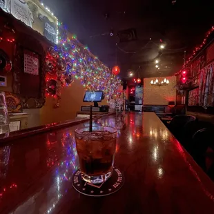 a drink sitting on a bar