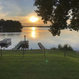 a sunset over the lake
