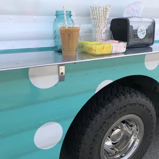 a blue and white food truck