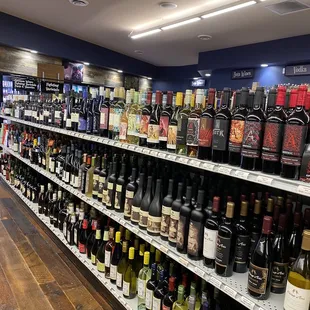 shelves of wine in a store