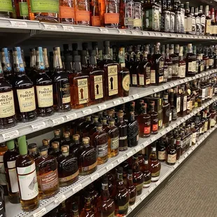 shelves of liquor in a grocery store