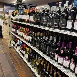 a variety of wines on shelves