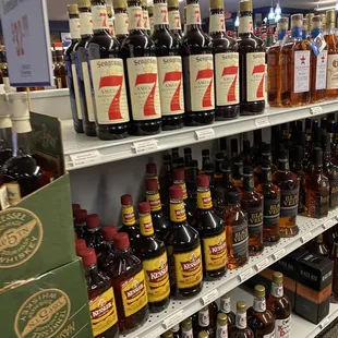 shelves of liquor in a grocery store