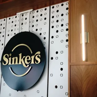 the sinker's logo on the wall