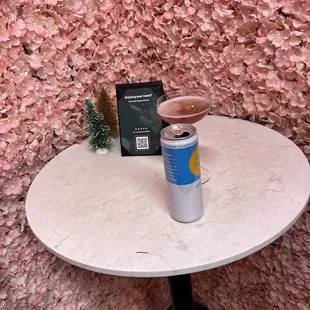 A table for cocktails in the hole #1 room