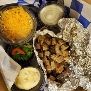 To go nachos packaged separately by request. Plenty for two, and it was great