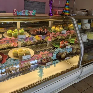 a display of cakes