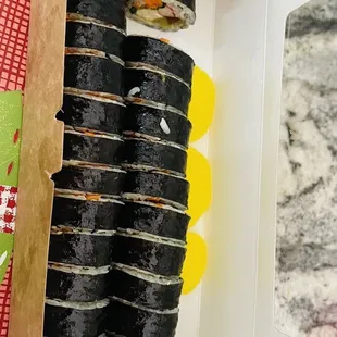 a box of sushi rolls