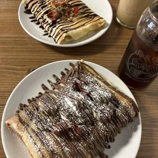 a plate of waffles with chocolate drizzle