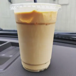 a cold beverage in a plastic cup