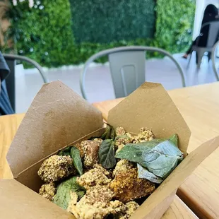 Niece enjoying her Popcorn Chicken - mild but still has a kick