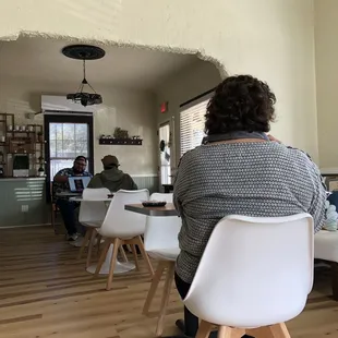 a woman sitting at a table