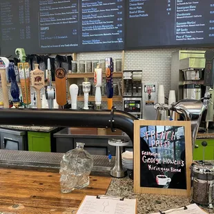 menus on the counter and menus on the wall