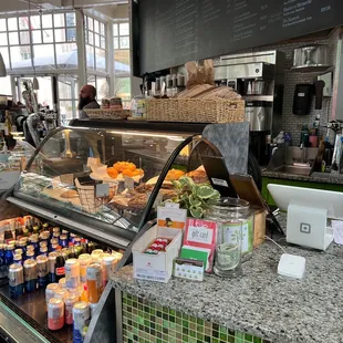 a counter with a variety of drinks