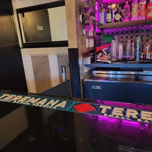 a bar with neon lights