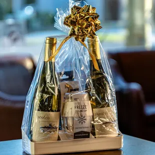 two bottles of wine in a gift bag