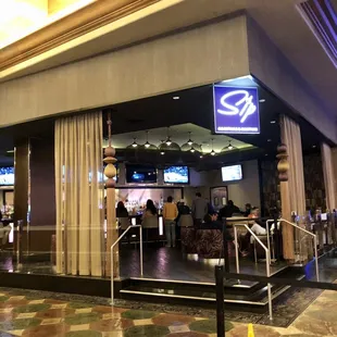 the entrance to the bar