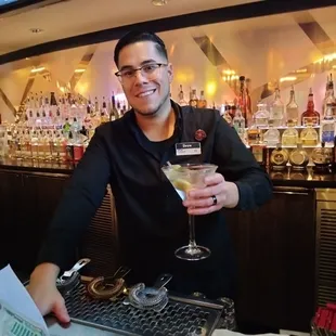 Gin martini with cheese stuffed olives, mixed by Drew!