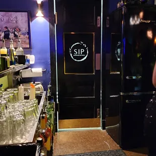 a man standing at the bar