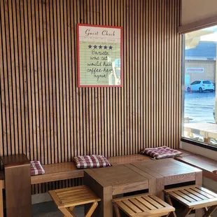 Wood panel wall and wood seating