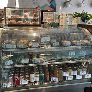 a variety of beverages in a display case