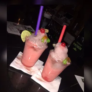 two glasses of fruity drinks