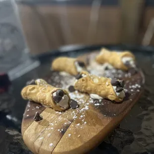 chocolate chip cookies on a wooden cutting board