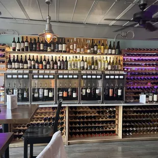 a wine cellar with many bottles of wine