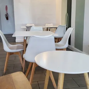 tables and chairs in a cafe