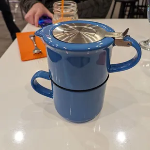 Loose leaf tea. Comes in a bag of loose leaves and this cute mug+pot setup