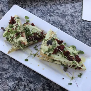 Avocado and goat cheese toast