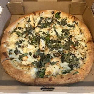 Spinach chicken Alfredo pizza