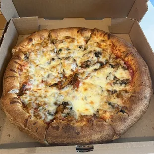 Sausage and mushroom pizza with extra thick crust