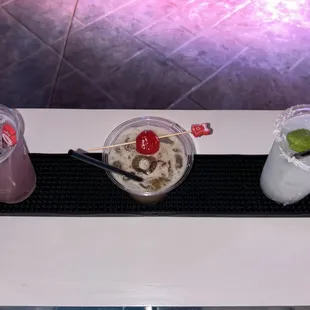 Pomegranate Margarita (Left)
Tamarind Whiskey Sour (Middle)
Coconut Mojito (Right)