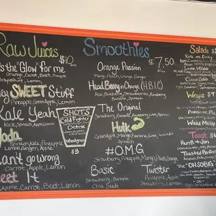 a blackboard with a variety of drinks