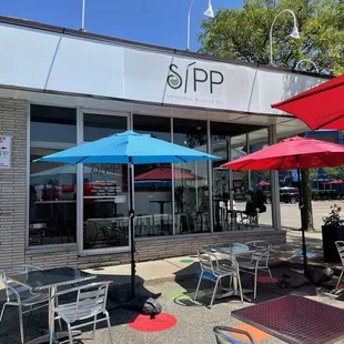 tables and umbrellas outside a restaurant