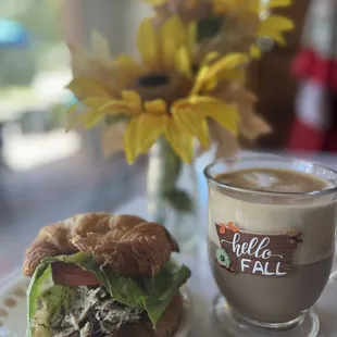 a sandwich and a cup of coffee