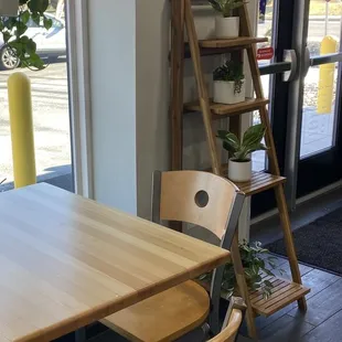 a table and chairs in a restaurant