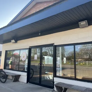 a bicycle parked outside a restaurant