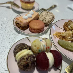 Variety of deliciousness- mini sandwiches, macarons, cupcakes  and many more