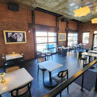 a restaurant with tables and chairs