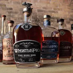 a selection of bottles of whiskey