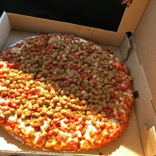 a pizza in a cardboard box