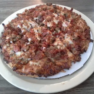 8" Meat Amore pizza.